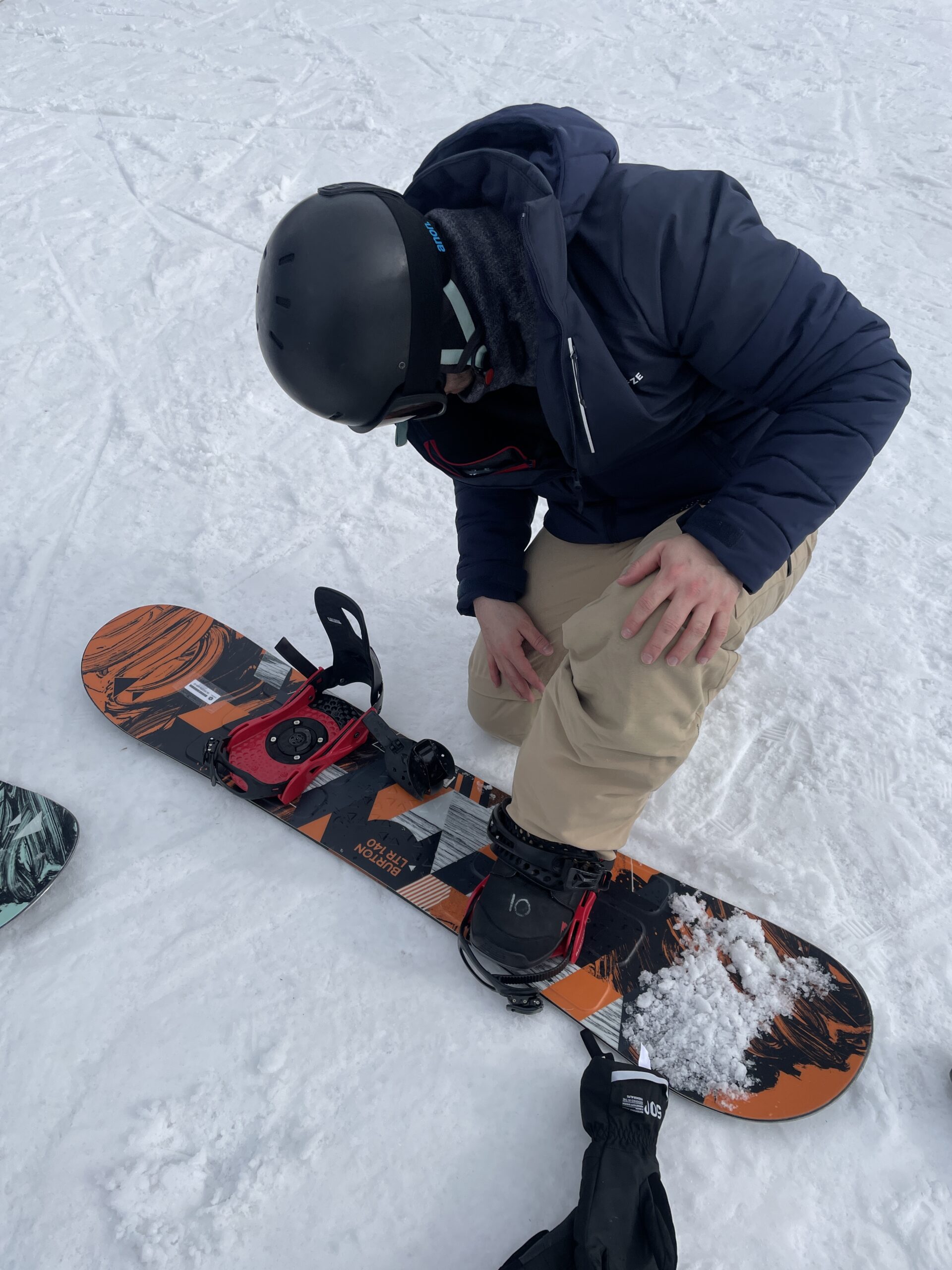 Nick strapped his leading foot, which was his left foot, onto the board