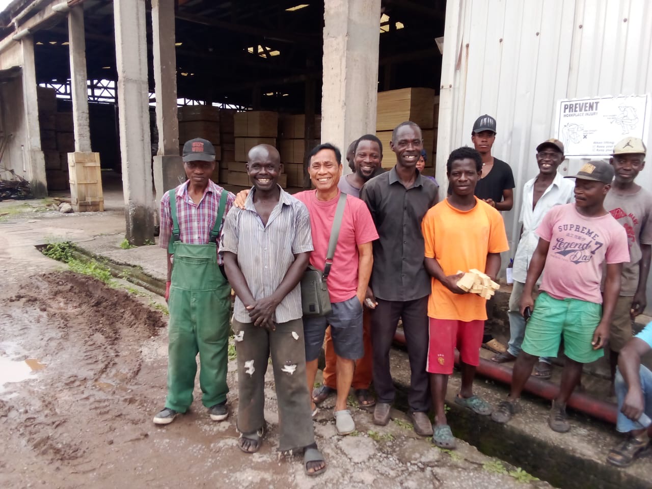 Papa and his staff in Ghana